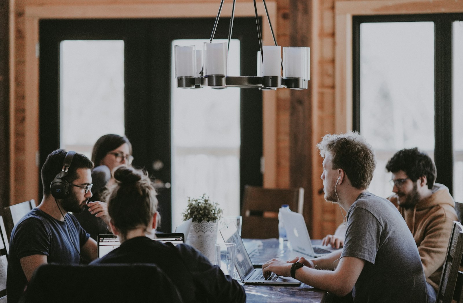 Diverse team collaborating on real estate investment